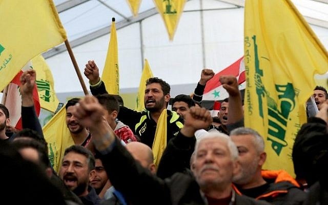 Supporters of Hezbollah chant slogans during a televised speech by leader Hassan Nasrallah in the southern town of Insar, Lebanon, on March 6, 2016. (AFP/Mahmoud Zayyat) Supporters of Hezbollah chant slogans during a televised speech by leader Hassan Nasrallah in the southern town of Insar, Lebanon, on March 6, 2016. (AFP/Mahmoud Zayyat)