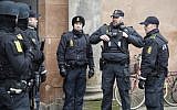 Illustrative - Danish policemen stand guard in front of the city court in Copenhagen, Denmark, March 10, 2016. (AFP/Scanpix Denmark/Emil Hougaard)