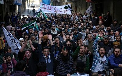 Protesters shout slogans during an anti-regime demonstration in the rebel-controlled Sukkari neighborhood of Syria's northern city of Aleppo on March 11, 2016 (AFP / KARAM AL-MASRI) Protesters shout slogans during an anti-regime demonstration in the rebel-controlled Sukkari neighborhood of Syria's northern city of Aleppo on March 11, 2016 (AFP / KARAM AL-MASRI)