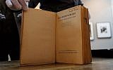 Anne and Margot Frank's copy of Grimm's Fairy Tales, pictured at Swann Auction Galleries in New York, March 16, 2016. ( AFP/Jewel Samad)
