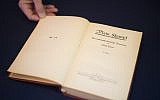 A copy of Nazi leader Adolf Hitler's political manifesto Mein Kampf, discovered at his Munich apartment and signed by eleven American officers, is on display March 18, 2016 before auction at Alexander Historical Auctions in Chesapeake City, (Jim Watson/AFP)