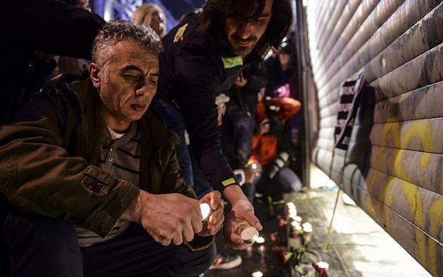 People light candles at the site of a blast on Istiklal Street, a major shopping and tourist district, in central Istanbul on March 19, 2016. A suicide blast ripped through Istanbul, killing three Israelis and one Iranian less than a week after another deadly attack left 35 dead in Ankara. (AFP / BULENT KILIC) People light candles at the site of a blast on Istiklal Street, a major shopping and tourist district, in central Istanbul on March 19, 2016. A suicide blast ripped through Istanbul, killing three Israelis and one Iranian less than a week after another deadly attack left 35 dead in Ankara. (AFP / BULENT KILIC)