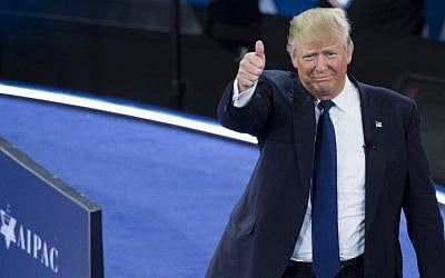 US Republican presidential hopeful Donald Trump gives a thumbs-up as he arrives to speak during the American Israel Public Affairs Committee (AIPAC) 2016 Policy Conference at the Verizon Center in Washington, DC, March 21, 2016. / AFP / SAUL LOEB