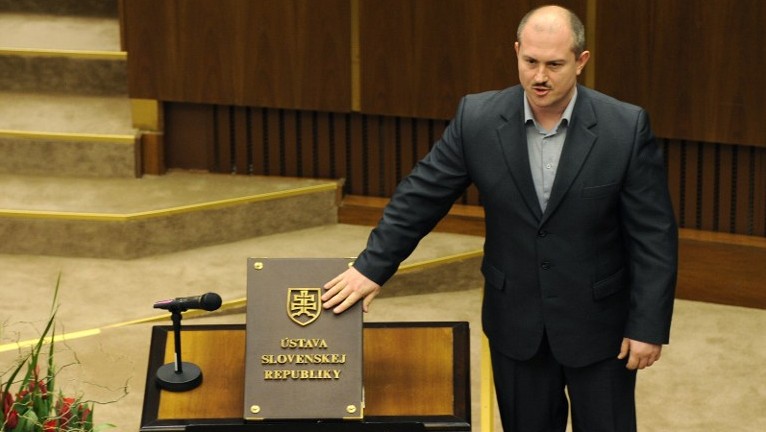 The leader of the far-right LS-Nase Slovensko (Our Slovakia) party Marian Kotleba takes the oath of office on the Slovak Constitution, March 23, 2016. (AFP/Samuel Kubani) The leader of the far-right LS-Nase Slovensko (Our Slovakia) party Marian Kotleba takes the oath of office on the Slovak Constitution, March 23, 2016. (AFP/Samuel Kubani)