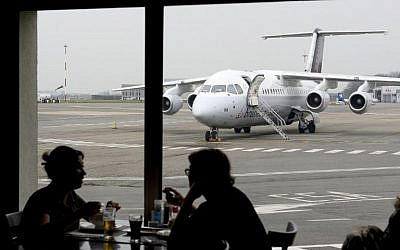 A Brussels Airlines plane is seen on the tarmac of Ostende airport, on March 24, 2016, in Ostend, two days after a triple bomb attack hit Brussels' airport and the Maelbeek subway station, killing 31 people and wounding 300 others. (AFP/Belga/Dirk Waem)