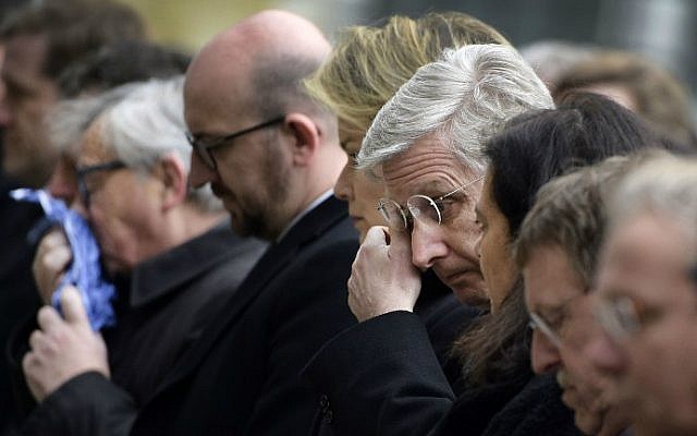 (From L) European Commission President Jean-Claude Juncker, Belgian Prime Minister Charles Michel and King Philippe of Belgium react before observing a minute of silence on March 24, 2016 at the Federal Parliament in Brussels, during a homage ceremony for victims two days after a triple bomb attack claimed by the Islamic State group hit Brussels's airport and the Maalbeek metro station, killing 31 people and wounding 270 others. (Yorick Jansens/Belga/AFP) (From L) European Commission President Jean-Claude Juncker, Belgian Prime Minister Charles Michel and King Philippe of Belgium react before observing a minute of silence on March 24, 2016 at the Federal Parliament in Brussels, during a homage ceremony for victims two days after a triple bomb attack claimed by the Islamic State group hit Brussels's airport and the Maalbeek metro station, killing 31 people and wounding 270 others. (Yorick Jansens/Belga/AFP)