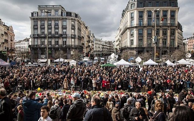 People gather on Place de la Bourse square in Brussels to pay tribute to the victims of the Brussels terror attacks, on March 25, 2016. (AFP/BELGA/Aurore Belot) People gather on Place de la Bourse square in Brussels to pay tribute to the victims of the Brussels terror attacks, on March 25, 2016. (AFP/BELGA/Aurore Belot)