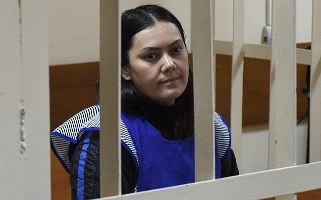 Gyulchekhra Bobokulova, a nanny suspected of killing a young girl in her care, sits inside a defendants' cage during a hearing at a court in Moscow, on March 2, 2016. (AFP PHOTO/VASILY MAXIMOV) Gyulchekhra Bobokulova, a nanny suspected of killing a young girl in her care, sits inside a defendants' cage during a hearing at a court in Moscow, on March 2, 2016. (AFP PHOTO/VASILY MAXIMOV)