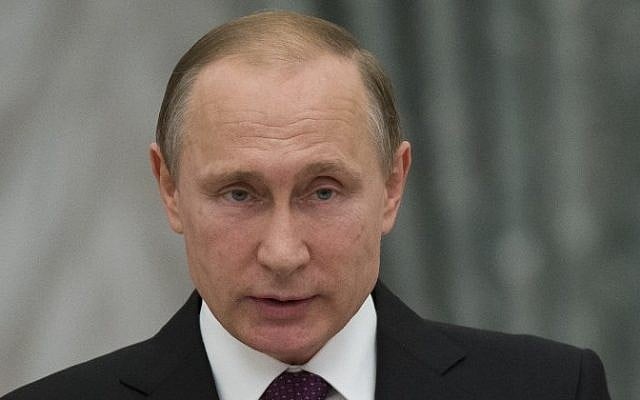 Russian President Vladimir Putin gives a speech during a state awards ceremony at the Kremlin in Moscow, March 10, 2016. (AFP/Pavel Golovkin/Pool)