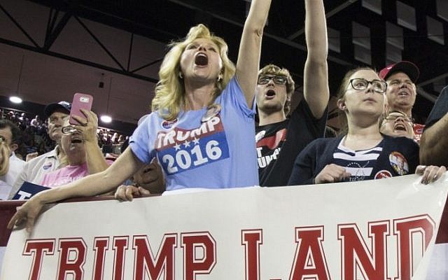 Maree Miller, of Cairo, Ga., reacts to Republican presidential candidate Donald Trump as he speaks to supporters during a rally at Valdosta State University February 29, 2016 in Valdosta, Georgia, on the eve of the Super Tuesday primaries (Mark Wallheiser/Getty Images/AFP)