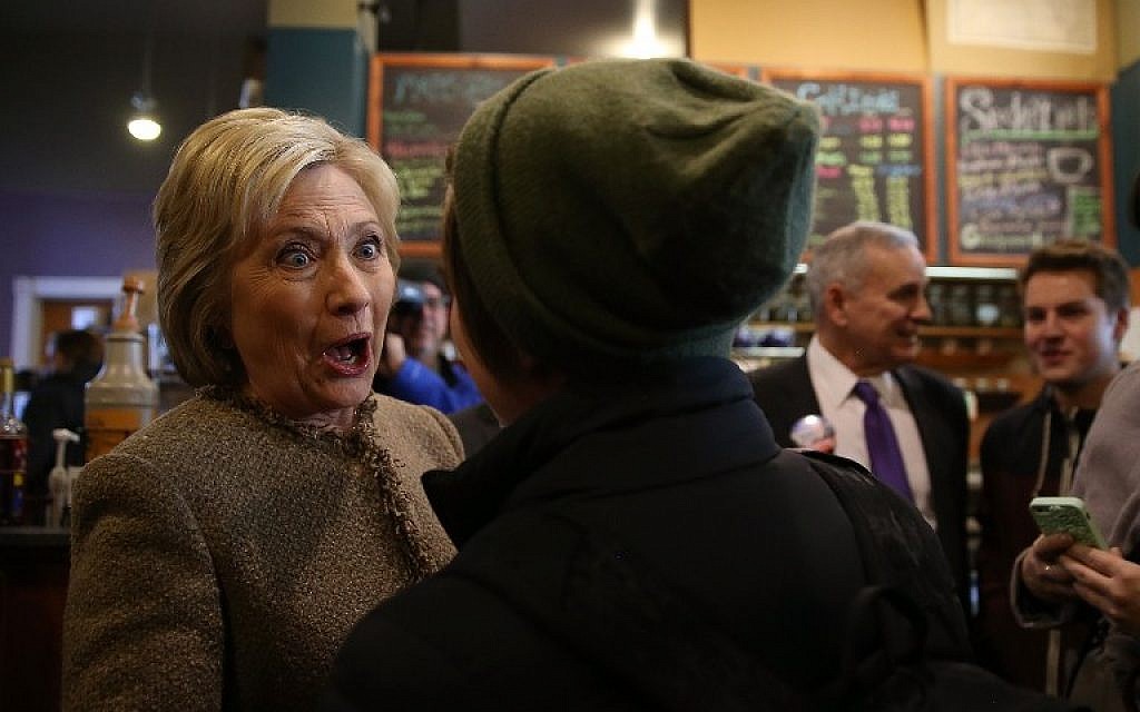 Democratic presidential candidate former secretary of state Hillary Clinton greets patrons at Mapps Coffee on March 1, 2016 in Minneapolis, Minnesota (Justin Sullivan/Getty Images/AFP)