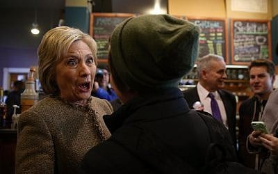 Democratic presidential candidate former secretary of state Hillary Clinton greets patrons at Mapps Coffee on March 1, 2016 in Minneapolis, Minnesota (Justin Sullivan/Getty Images/AFP)