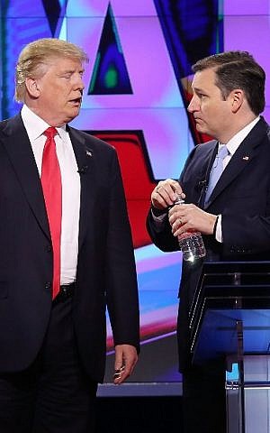 Republican presidential candidates Donald Trump and Sen. Ted Cruz (R-TX), talk during a broadcast break in the CNN, Salem Media Group, The Washington Times Republican Presidential Primary Debate on the campus of the University of Miami on March 10, 2016 in Coral Gables, Florida. (Joe Raedle/Getty Images/AFP) Republican presidential candidates Donald Trump and Sen. Ted Cruz (R-TX), talk during a broadcast break in the CNN, Salem Media Group, The Washington Times Republican Presidential Primary Debate on the campus of the University of Miami on March 10, 2016 in Coral Gables, Florida. (Joe Raedle/Getty Images/AFP)