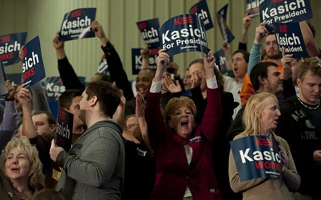 Supporters cheer Republican presidential candidate, Ohio Gov. John Kasich at Baldwin Wallace University March 15, 2015 in Berea, Ohio. (Jeff Swensen/Getty Images/AFP)