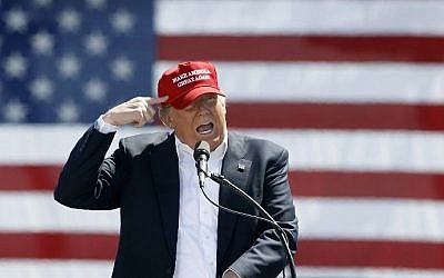 Republican presidential candidate Donald Trump speaks to guest gathered at Fountain Park during a campaign rally in Fountain Hills, Arizona, March 19, 2016 . (Ralph Freso/Getty Images/AFP)