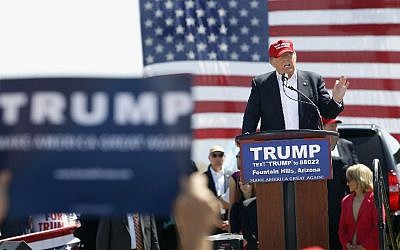 Republican presidential candidate Donald Trump speaks to guests gathered at Fountain Park during a campaign rally in Fountain Hills, Arizona, on March 19, 2016. (Ralph Freso/Getty Images/AFP)