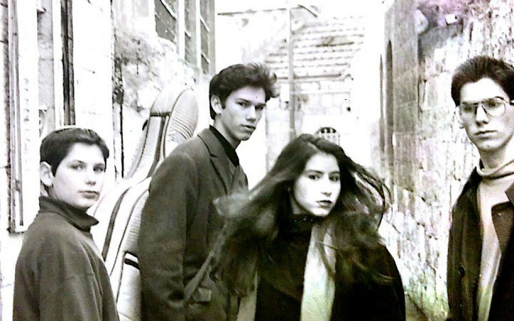 Ricka Razel (second from right) and her brothers outside their childhood home in the Nahlaot neighborhood of Jerusalem (Courtesy Ricka Razel Van-Leeuwen) Ricka Razel (second from right) and her brothers outside their childhood home in the Nahlaot neighborhood of Jerusalem (Courtesy Ricka Razel Van-Leeuwen)