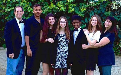 Susan Silverman (right) and Yosef Abramowitz (left) with their children Adar, Aliza, Ashira, Zamir and Hallel at Ashira's bat mitzvah, Jerusalem, December 2015. (Courtesy)