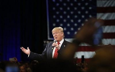 Republican presidential candidate Donald Trump speaks to supporters during a town hall meeting on March 14, 2016 at the Tampa Convention Center in Tampa , Florida (Brian Blanco/Getty Images/AFP) 