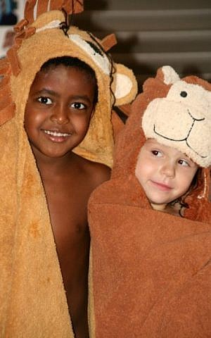 'Twins' Zamir and Ashira Abramowitz at ages 4 and 2.5. Zamir was adopted shortly after Ashira was born. (Courtesy)