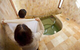 Illustrative: A mikveh immersion for the purpose of conversion to Judaism. (Mayyim Hayyim/Tom Kates via JTA)