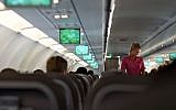 Illustrative photo of an air stewardess on board a flight. (CC BY 2.0 Flikr/Paul Stocker)