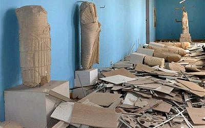 This photo released on Sunday March 27, 2016, by the Syrian official news agency SANA, shows destroyed statues at the damaged museum in Palmyra, recently retaken from the Islamic State. (SANA via AP) This photo released on Sunday March 27, 2016, by the Syrian official news agency SANA, shows destroyed statues at the damaged museum in Palmyra, recently retaken from the Islamic State. (SANA via AP)
