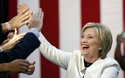 Democratic presidential candidate Hillary Clinton arrives to address supporters at her Super Tuesday election night rally in Miami, Tuesday, March 1, 2016. (AP Photo/Gerald Herbert)
