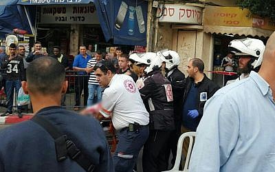 Medics evacuate the victim of  a stabbing attack in Petah Tikva on March 8, 2016. (Magen David Adom)