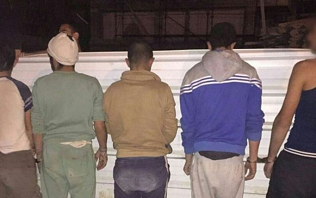 File: Police arrest a group of 22 Palestinians who were living in Israel illegally near the Besor Stream national park on March 10, 2016. (Israel Police) File: Police arrest a group of 22 Palestinians who were living in Israel illegally near the Besor Stream national park on March 10, 2016. (Israel Police)