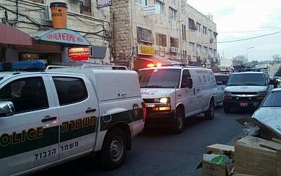 Ambulances and police vehicles arrive at the scene of a shooting attack on Salah a-Din street in Jerusalem on Tuesday, March 8, 2016 (Magen David Adom)