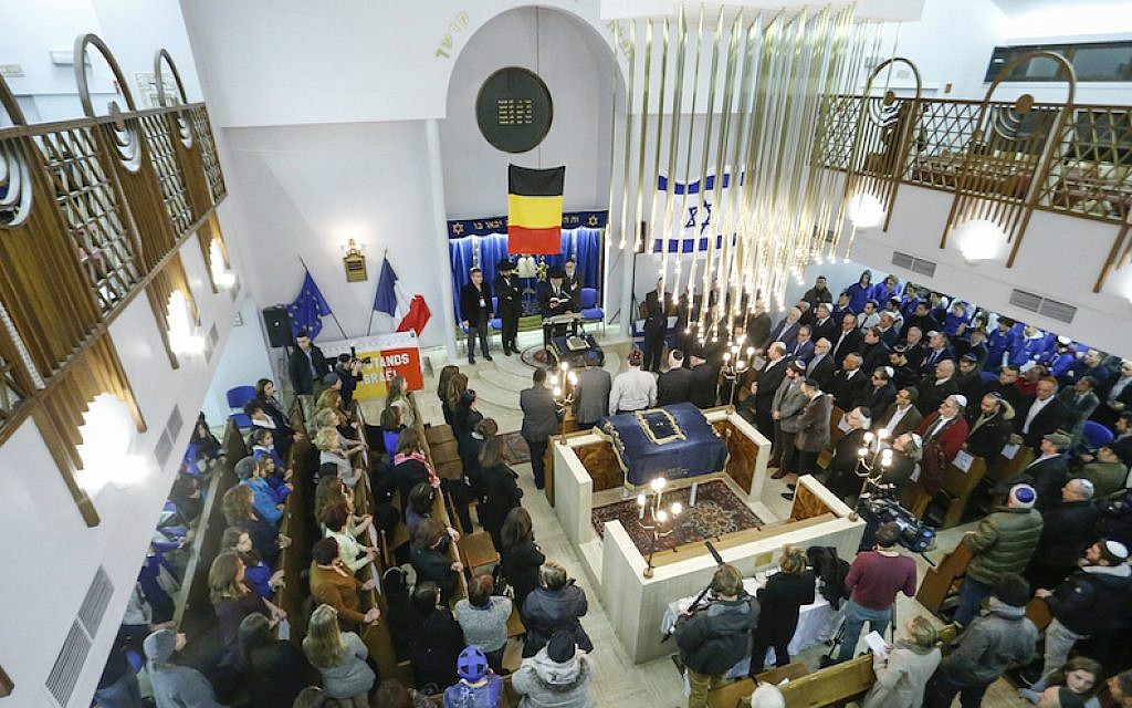 A tribute ceremony in the Maale synagogue in Brussels days after the attacks on the Charlie Hebdo newspaper and the Hyper Cacher kosher market, Jan. 14, 2015. (Thierry Roge/AFP/Getty Images via JTA) A tribute ceremony in the Maale synagogue in Brussels days after the attacks on the Charlie Hebdo newspaper and the Hyper Cacher kosher market, Jan. 14, 2015. (Thierry Roge/AFP/Getty Images via JTA)