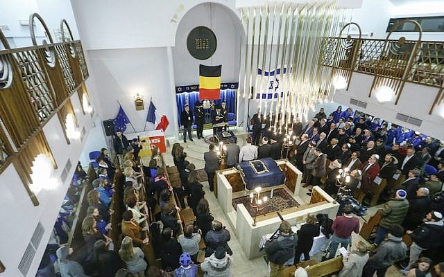 A tribute ceremony in the Maale synagogue in Brussels days after the attacks on the Charlie Hebdo newspaper and the Hyper Cacher kosher market, Jan. 14, 2015. (Thierry Roge/AFP/Getty Images via JTA) A tribute ceremony in the Maale synagogue in Brussels days after the attacks on the Charlie Hebdo newspaper and the Hyper Cacher kosher market, Jan. 14, 2015. (Thierry Roge/AFP/Getty Images via JTA)