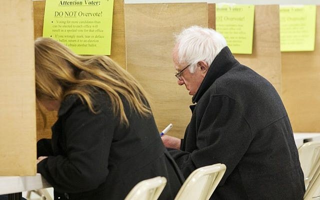 Democratic presidential candidate Sen. Bernie Sanders, I-Vt., and his wife Jane Sanders vote in the Vermont primary at the Robert Miller Community and Recreation Center in Burlington, Vermont, Tuesday, March 1, 2016, on Super Tuesday (AP Photo/Jacquelyn Martin)