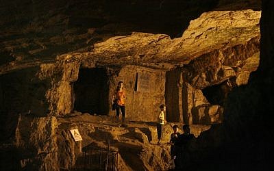 Visitors explore Zedekiah's Cave, also known as Solomon's Quarries, an underground limestone quarry that runs the length of five city blocks under the Muslim Quarter of the Old City of Jerusalem on August 21, 2008. (Michal Fattal /FLASH90)