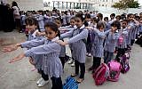 Illustrative. Palestinian students seen on their first day of the new school year in the West Bank city of Ramallah, on August 25, 2013. (Issam Rimawi/FLASH90/File)