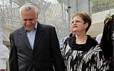 Former president Moshe Katsav, left, serving a seven-year sentence for rape, seen with his wife, Gila, leaving Ma'asiyahu Prison for a furlough over the Jewish holiday of Passover, April 3, 2015. (Flash90)