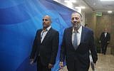 Interior Minister Aryeh Deri (R) arrives at the Prime Minister's Office in Jerusalem for the weekly cabinet meeting, March 6, 2016. (Marc Israel Sellem/Pool)