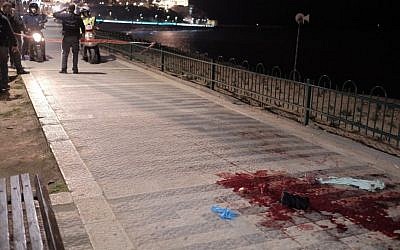 Security forces and and medics at the scene of a stabbing attack that killed one and injured nine others in Jaffa on March 8, 2016. (Tomer Neuberg/Flash90) Security forces and and medics at the scene of a stabbing attack that killed one and injured nine others in Jaffa on March 8, 2016. (Tomer Neuberg/Flash90)
