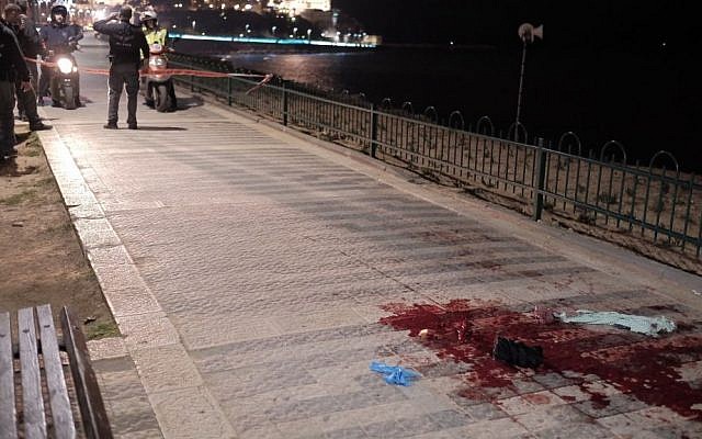 Security forces and and medics at the scene of a stabbing attack that killed one and injured nine others in Jaffa on March 8, 2016 (Tomer Neuberg/Flash90) Security forces and and medics at the scene of a stabbing attack that killed one and injured nine others in Jaffa on March 8, 2016 (Tomer Neuberg/Flash90)