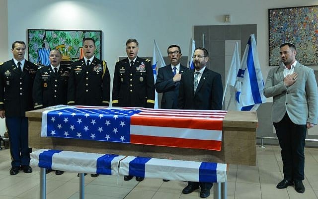 Israeli and American officials participate in a goodbye ceremony for Taylor Force, the US citizen killed in a stabbing terror attack in Jaffa, as his body is sent back to be buried in the United States, at Ben Gurion Airport near Tel Aviv, on Friday, March 11, 2016. (Flash90)