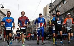 Runners take part in the international Jerusalem Marathon on March 18, 2016. (Nati Shohat/Flash90)
