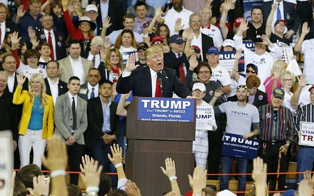 Republican presidential candidate Donald Trump at a campaign rally, Saturday, March 5, 2016, in Orlando, Florida. (AP Photo/Brynn Anderson) Republican presidential candidate Donald Trump at a campaign rally, Saturday, March 5, 2016, in Orlando, Florida. (AP Photo/Brynn Anderson)