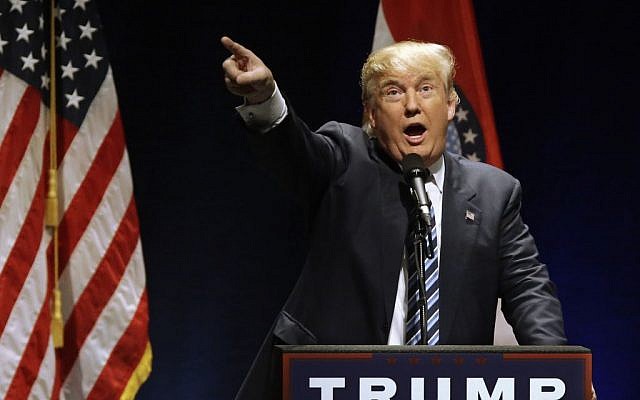 Republican presidential candidate Donald Trump speaks during a campaign rally Friday, March 11, 2016, in St. Louis. (AP Photo/Seth Perlman) Republican presidential candidate Donald Trump speaks during a campaign rally Friday, March 11, 2016, in St. Louis. (AP Photo/Seth Perlman)