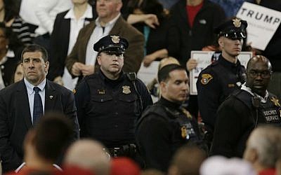 The Secret Service and Cleveland Police keep a close watch as Republican presidential candidate Donald Trump speaks at a campaign rally at the I-X Center in Cleveland, Saturday, March 12, 2016. (AP Photo/Tony Dejak)