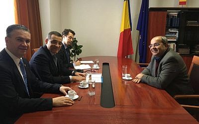 Ahmed Tibi, right, meeting with Romanian lawmakers in Bucharest on March 24, 2016. (Joint List spokesperson)