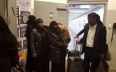 The final group of Jewish immigrants from Yemen arrives in Israel accompanied by an ancient Torah scroll, March 20, 2016. (Arielle Di-Porto/The Jewish Agency for Israel)