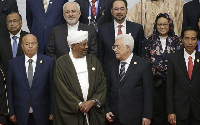 Indonesian President Joko "Jokowi" Widodo, front row right, joins other participants, first row from left, Yemen's President Abdo Rabbo Mansour Hadi, Sudan's President Omar al Bashir, Palestinian President Mahmoud Abbas, and second row from left, Bangladesh's Foreign Minister Abul Hassan Mahmood Ali, Iran's Foreign Minister Mohammad Javad Zarif, Afghanistan's Foreign Minister Salahuddin Rabbani and Indonesian Foreign Minister Retno Marsudi for a group photo session at the extraordinary Organization of Islamic Cooperation (OIC) summit on Palestinian issues in Jakarta, Indonesia, Monday, March 7, 2016. (AP Photo/Dita Alangkara). Indonesian President Joko "Jokowi" Widodo, front row right, joins other participants, first row from left, Yemen's President Abdo Rabbo Mansour Hadi, Sudan's President Omar al Bashir, Palestinian President Mahmoud Abbas, and second row from left, Bangladesh's Foreign Minister Abul Hassan Mahmood Ali, Iran's Foreign Minister Mohammad Javad Zarif, Afghanistan's Foreign Minister Salahuddin Rabbani and Indonesian Foreign Minister Retno Marsudi for a group photo session at the extraordinary Organization of Islamic Cooperation (OIC) summit on Palestinian issues in Jakarta, Indonesia, Monday, March 7, 2016. (AP Photo/Dita Alangkara).