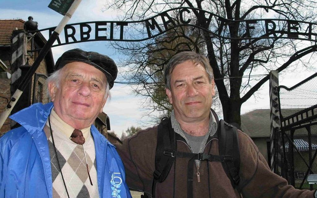 Holocaust survivor Jack Adler (left) with his son, Eli, at Auschwitz, where Jack was an inmate during World War II. (Monise Neuman) Holocaust survivor Jack Adler (left) with his son, Eli, at Auschwitz, where Jack was an inmate during World War II. (Monise Neuman)