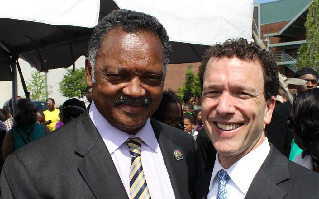 Rabbi Micah Greenstein (right) led prayer at a dedication ceremony, which included Rev. Jesse Jackson, for 'Dr. M. L. King Jr. Ave.' in downtown Memphis, April 4, 2012, 44 years after Dr. King was killed in Memphis. (courtesy) Rabbi Micah Greenstein (right) led prayer at a dedication ceremony, which included Rev. Jesse Jackson, for 'Dr. M. L. King Jr. Ave.' in downtown Memphis, April 4, 2012, 44 years after Dr. King was killed in Memphis. (courtesy)